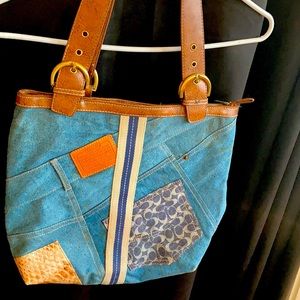 Coach brand denim and leather tote. Some wear.